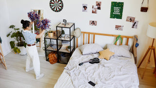 An Asian woman dancing, well-designed bedroom.