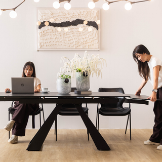 Extendable dining table with chairs